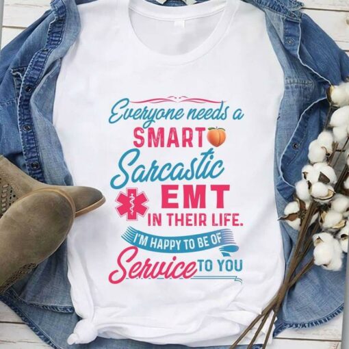 Everyone Needs A Smart Sarcastic Emt In Their Life I’m Happy To Be Of Service To You Peach Emt Logo Shirt