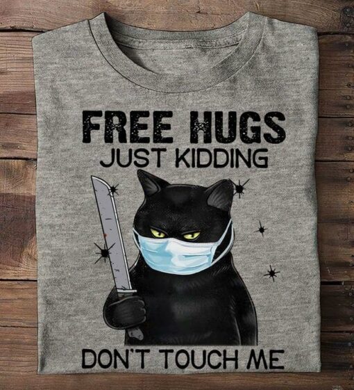 Free Hugs Just Kidding Don’t Touch Me Black Cat Wearing Mask Holding Sword Shirt